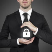 Man with lock, image courtesy of Shutterstock