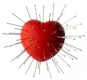 Heart with pins. Image courtesy of Shutterstock.