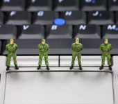 Army and computer. Image courtesy of Shutterstock.
