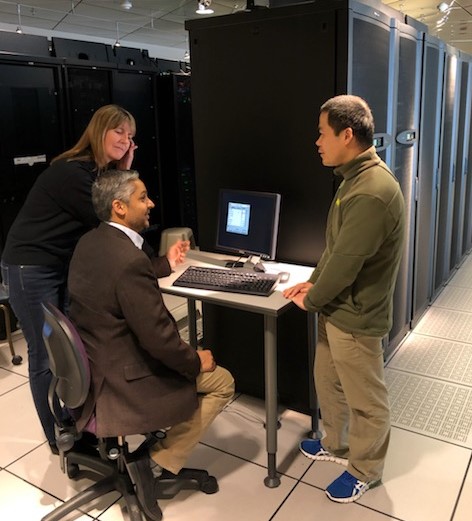 L-R: Lori Floyd, CERIAS office manager, Purdue University; Dr. Ken Patel, Sanager of Purdue partnerships, Sandia National Labs; Dr. Dongyan Xu, CERIAS director