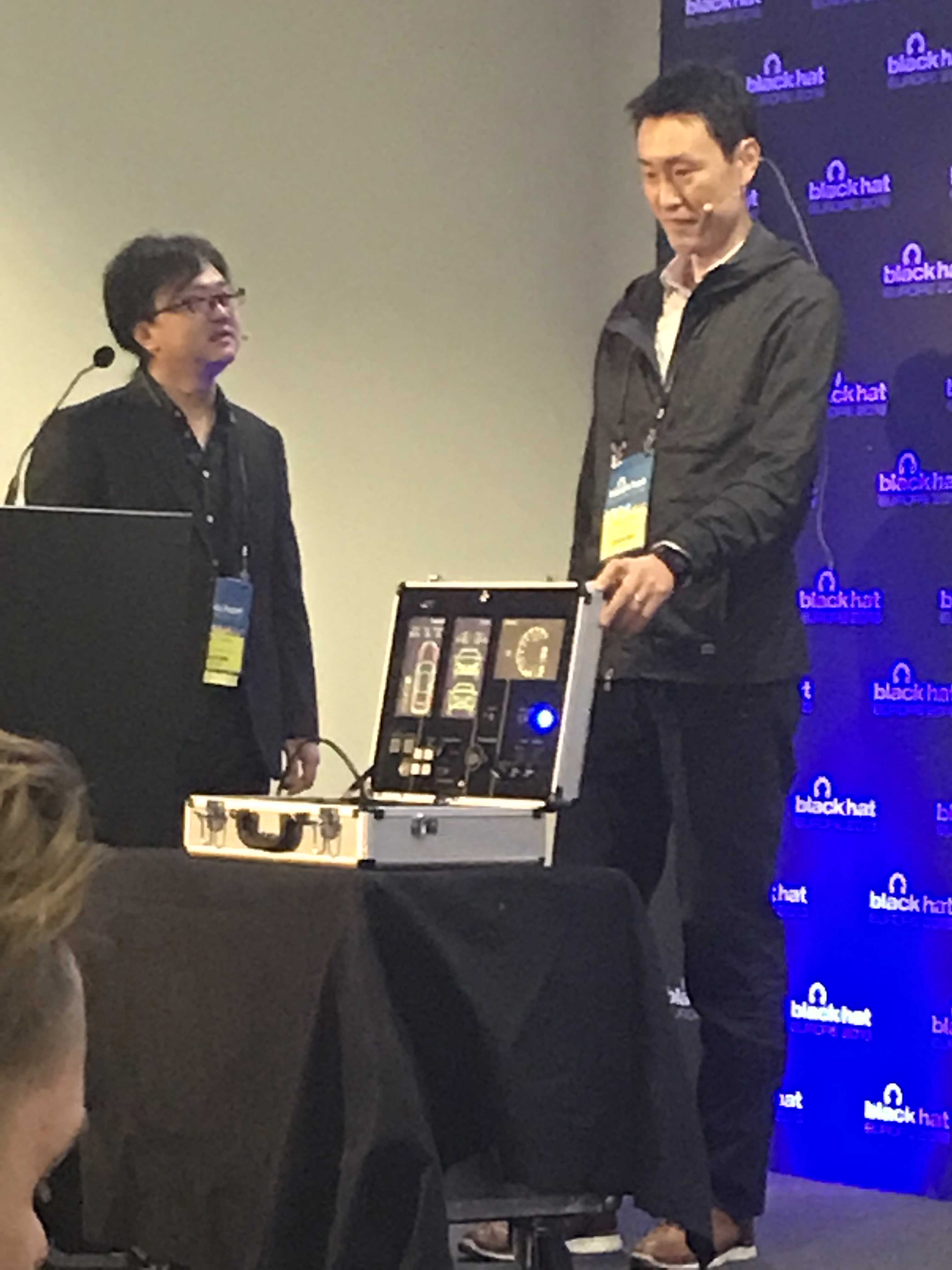 Toyota's Tsuyoshi Toyama (left) and Takuya Yoshida (right) show off the PASTA testing platform at Black Hat Europe.